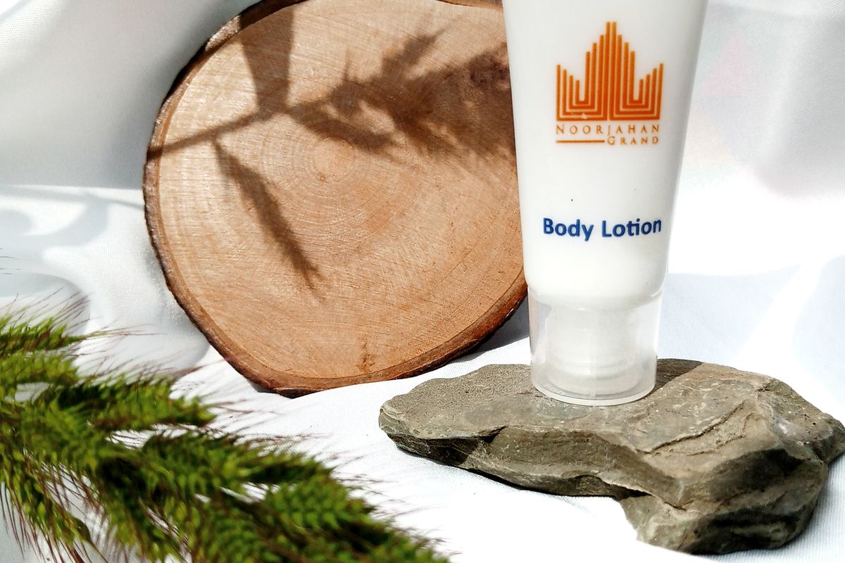 Body lotion bottle on a bathroom counter