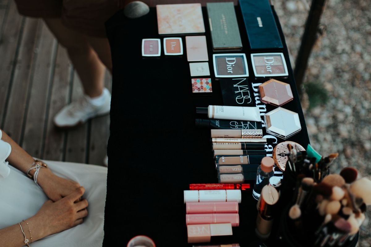 Foundation swatches along a jawline checked in natural daylight