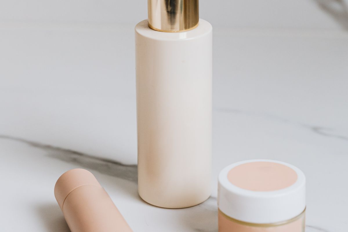 A gel moisturizer and a cream moisturizer side by side in daylight