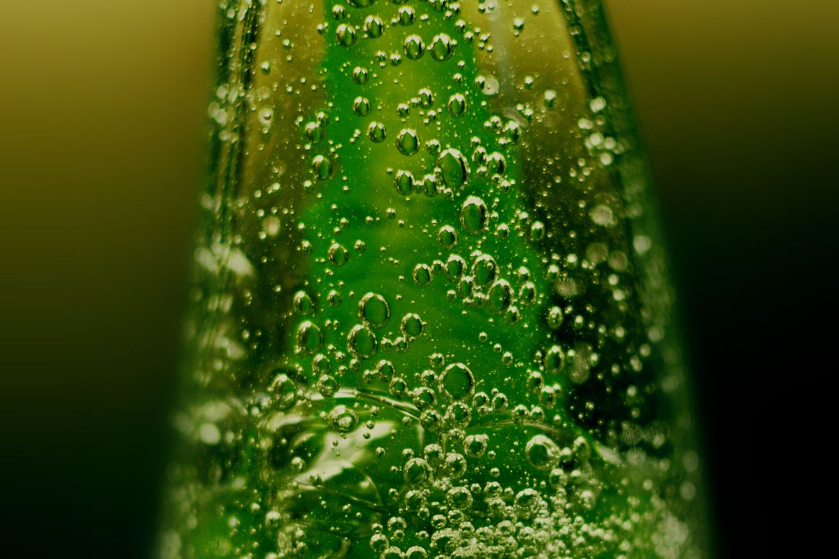 Clear gel serum in a glass dropper