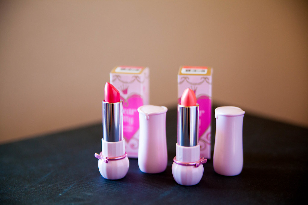 Lipsticks and makeup products on a table