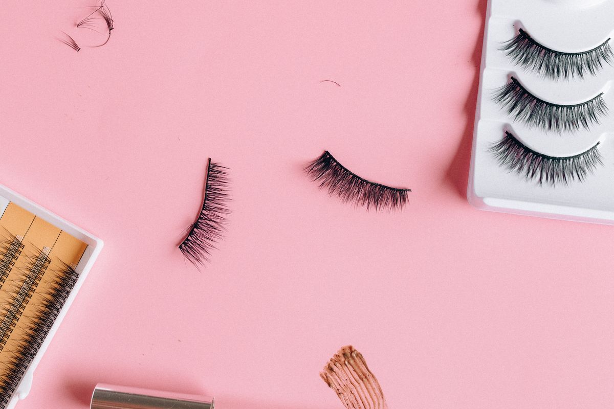 Mascara wand close to the eye